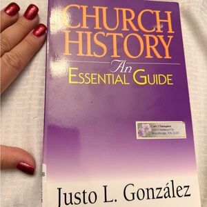 Church History: An Essential Guide by Justo L. González - Purple Cover